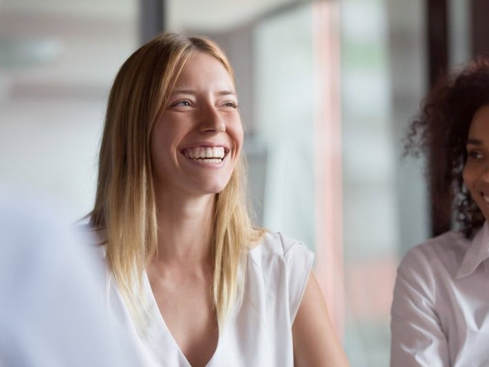 LMS hosting satisfaction - woman smiling