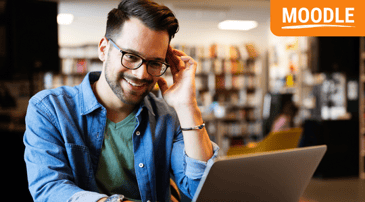 man uploading moodle courses