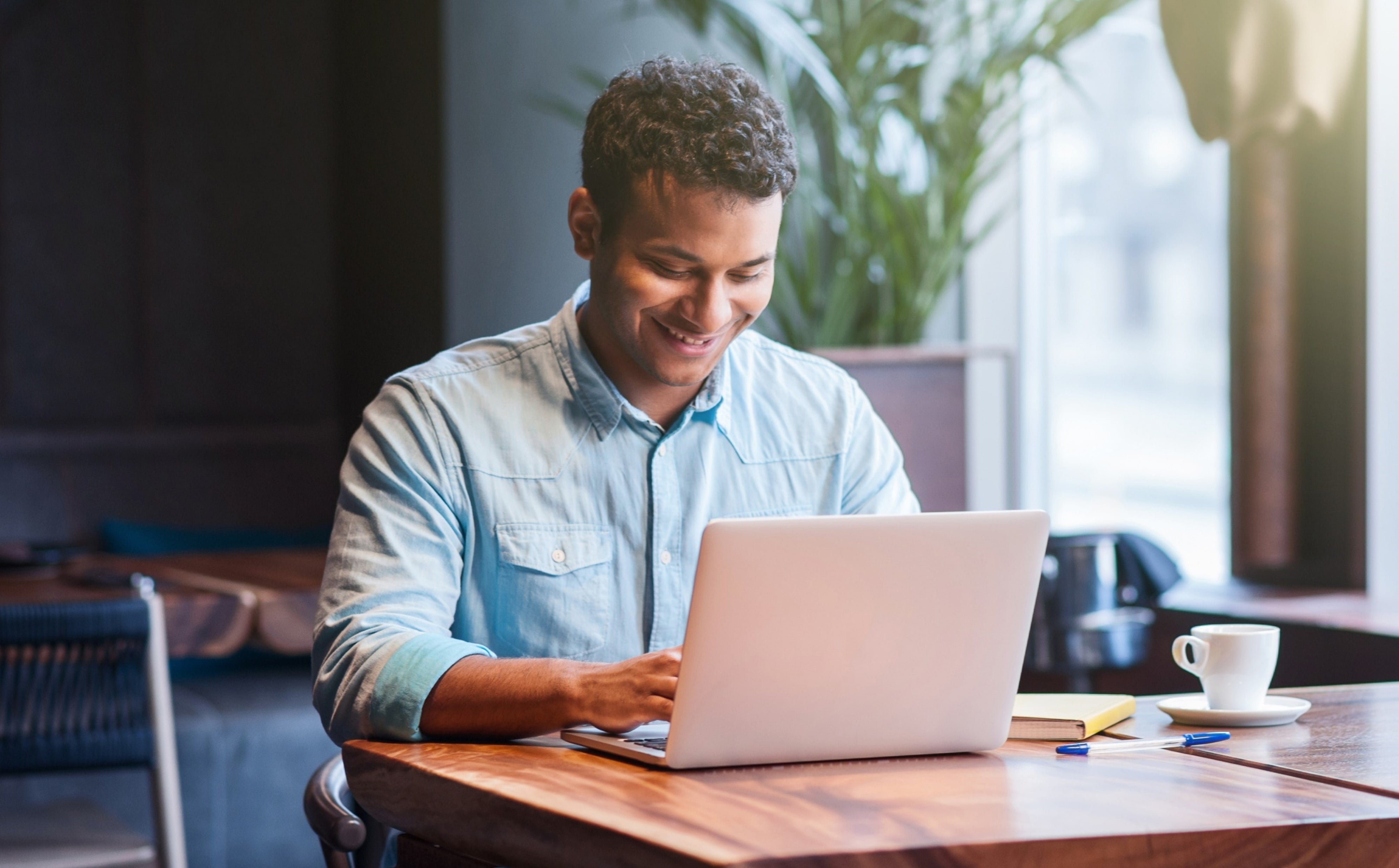 Employee completing e learning assessment on laptop 